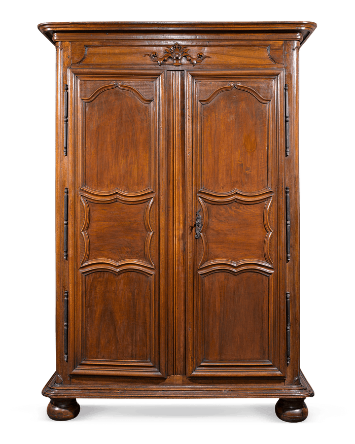 This elegant French armoire exemplifies the beauty of Provincial furnishings