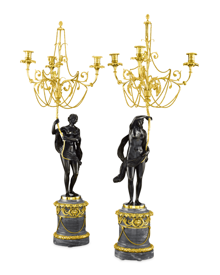 Classical nudes support these delicate lights