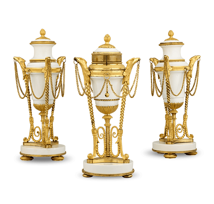 Louis XVI Style Gilt Marble Cassolettes and Clock