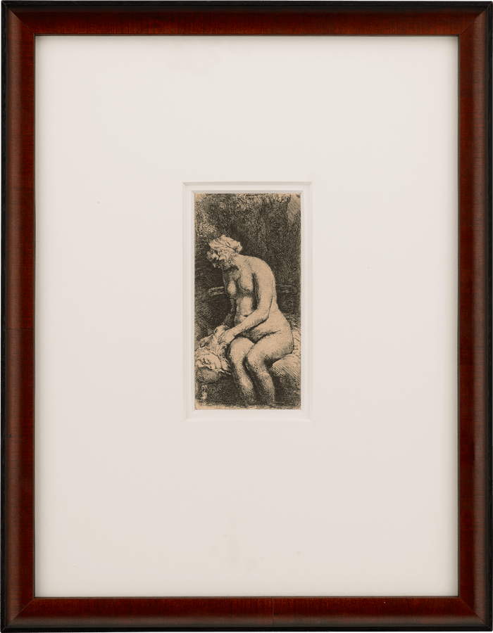Woman Bathing Her Feet in a Brook by Rembrandt van Rijn